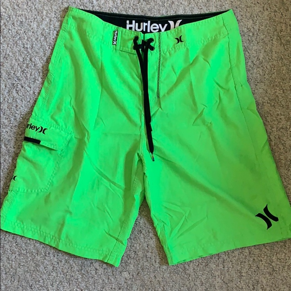 Bright green swim shorts